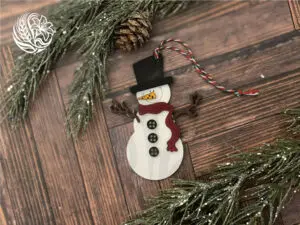 handcrafted wooden snowman ornament