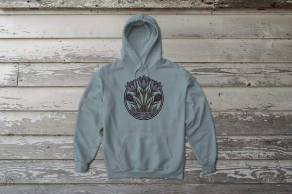 Crocuses Bunnyhug featuring purple Saskatchewan crocus flowers on blue-mist-coloured premium fleece hoodie