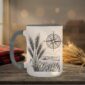 Field And Compass Mug with navigation design on white ceramic with coloured interior, Saskatchewan handcrafted coffee cup