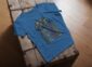 Land of Living Skies T-Shirt design showcasing Saskatchewan's famous nickname on premium organic cotton