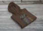 Land of Living Skies Bunnyhug displayed on rustic Saskatchewan barn wood background