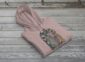Land of Living Skies Bunnyhug displayed on rustic Saskatchewan barn wood background