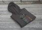 Land of Living Skies Bunnyhug displayed on rustic Saskatchewan barn wood background