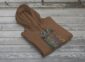 Land of Living Skies Bunnyhug displayed on rustic Saskatchewan barn wood background