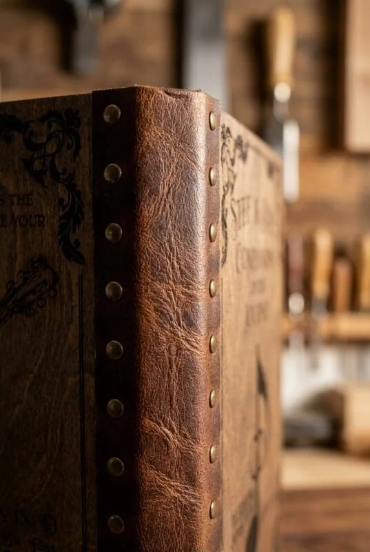 Leather spine binding metal rivets detail custom wedding songbook handcrafted Saskatchewan