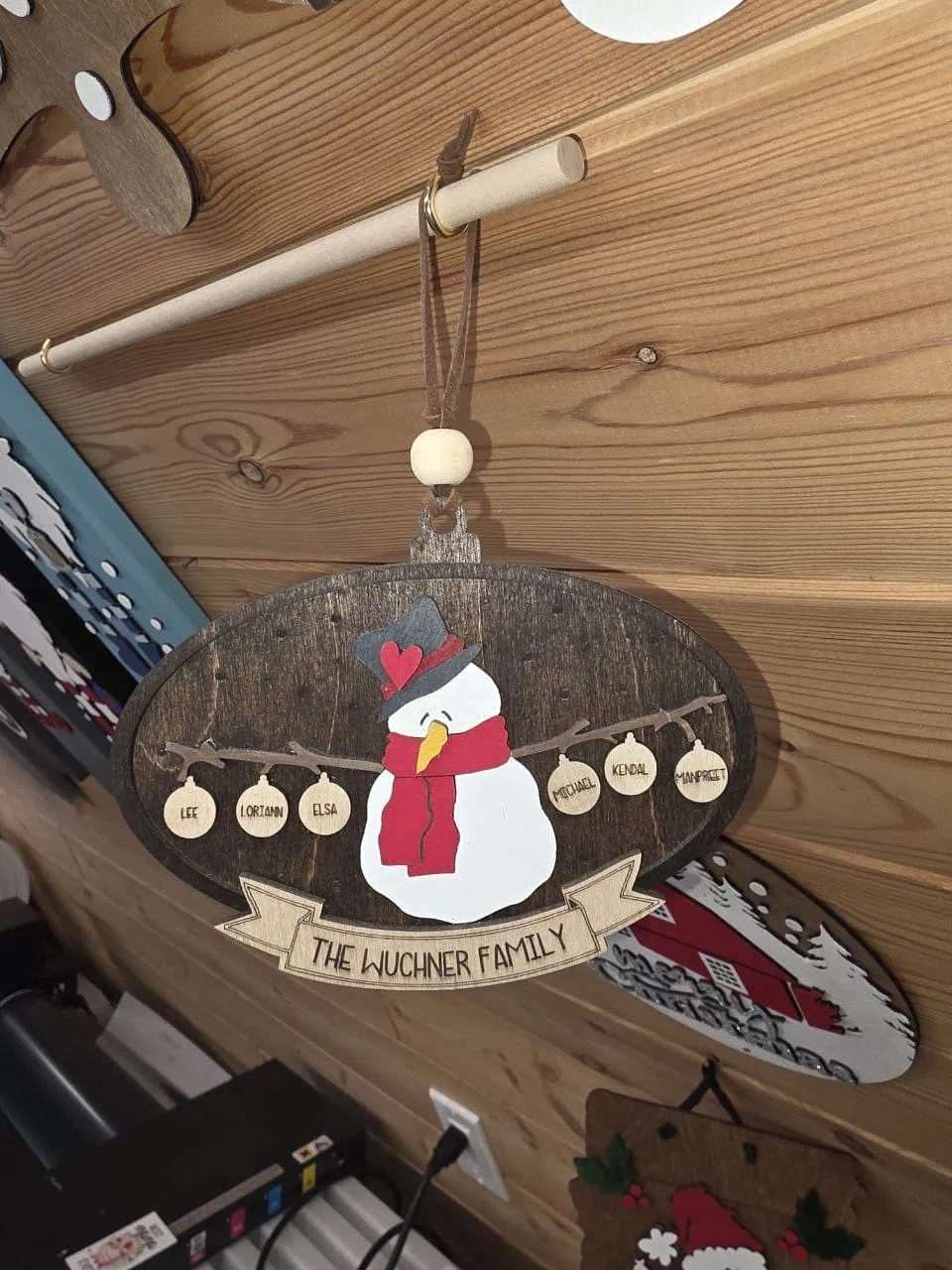 Custom Grey Barn orders Saskatchewan — laser-engraved snowman wooden ornament handcrafted in St. Gregor workshop