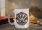 Crocuses Mug in black featuring purple Saskatchewan crocus flowers on white ceramic