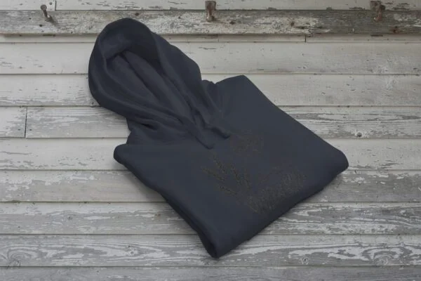 Field and Compass Bunnyhug design showing compass and field elements on premium Saskatchewan hoodie