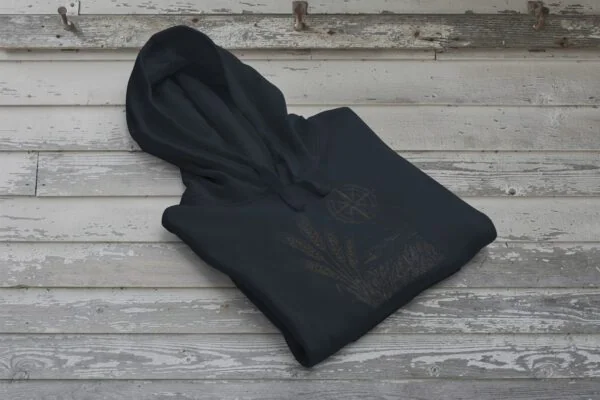 Field and Compass Bunnyhug design showing compass and field elements on premium Saskatchewan hoodie