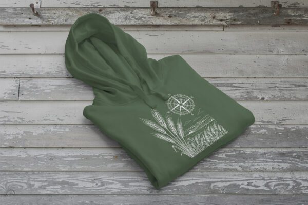 Field and Compass Bunnyhug design showing compass and field elements on premium Saskatchewan hoodie