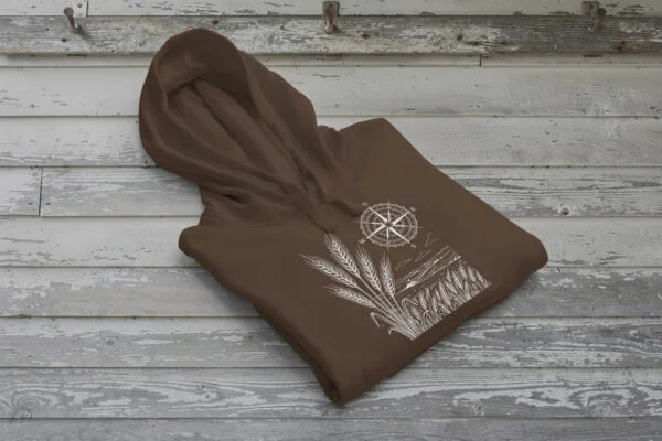 Field and Compass Bunnyhug design showing compass and field elements on premium Saskatchewan hoodie