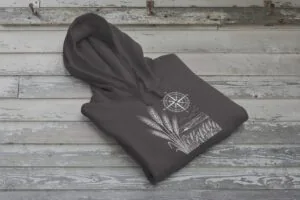 Field and Compass Bunnyhug design showing compass and field elements on premium Saskatchewan hoodie