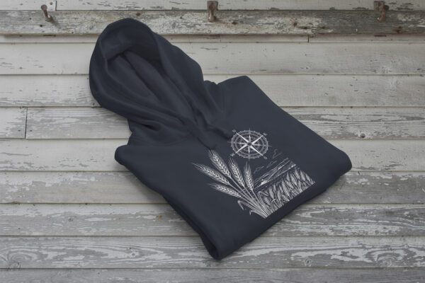 Field and Compass Bunnyhug design showing compass and field elements on premium Saskatchewan hoodie