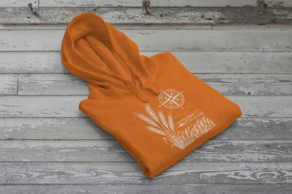 Field and Compass Bunnyhug design showing compass and field elements on premium Saskatchewan hoodie