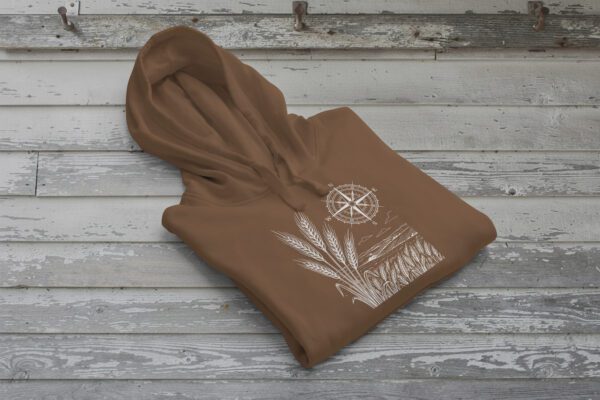 Field and Compass Bunnyhug design showing compass and field elements on premium Saskatchewan hoodie