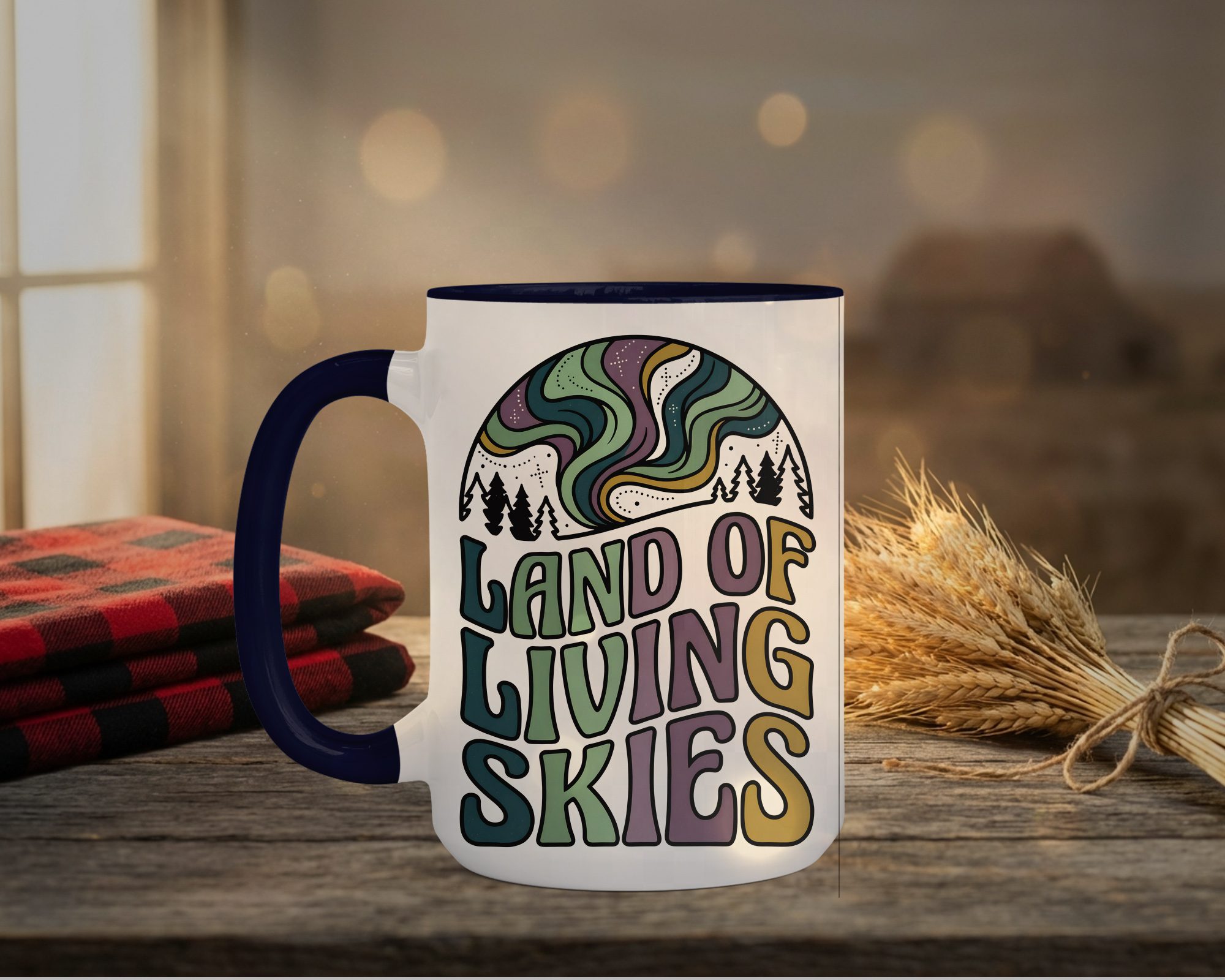 Land Of Living Skies Mug in blue interior showing Saskatchewan prairie sky design on white ceramic coffee cup