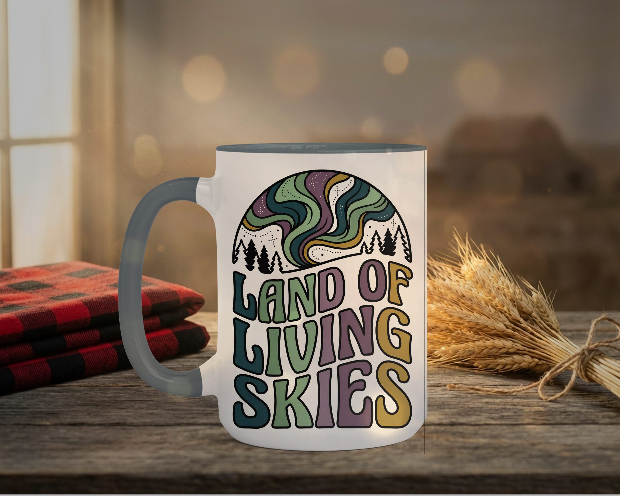 Land Of Living Skies Mug in grey interior showing Saskatchewan prairie sky design on white ceramic coffee cup