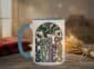 Land Of Living Skies Mug in light blue interior showing Saskatchewan prairie sky design on white ceramic coffee cup
