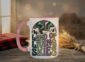 Land Of Living Skies Mug in pink interior showing Saskatchewan prairie sky design on white ceramic coffee cup
