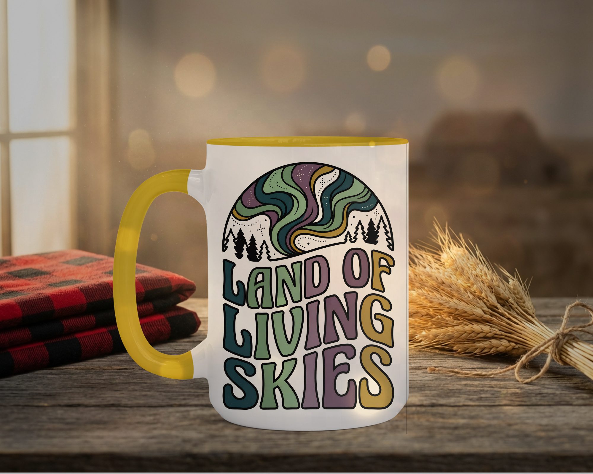 Land Of Living Skies Mug in yellow interior showing Saskatchewan prairie sky design on white ceramic coffee cup
