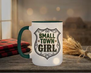Small Town Girl Mug in green interior showing Saskatchewan design on white ceramic coffee mug
