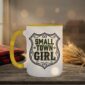 Small Town Girl Mug in yellow interior showing Saskatchewan design on white ceramic coffee mug
