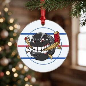 Round team ornament on a Christmas tree, hockey puck team logo on an ice rink design