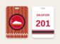 Track and field bag tag, team logo on a running track and name and number on the back