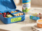 Waterproof name labels on a lunch box, food containers and a water bottle