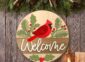 Laser Cut Cardinal Welcome Sign on the wall