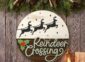 Reindeer Crossing Door Sign on the wall