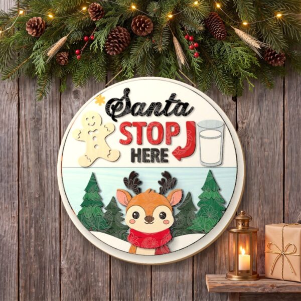 Reindeer Santa Stop Here Sign on the wall