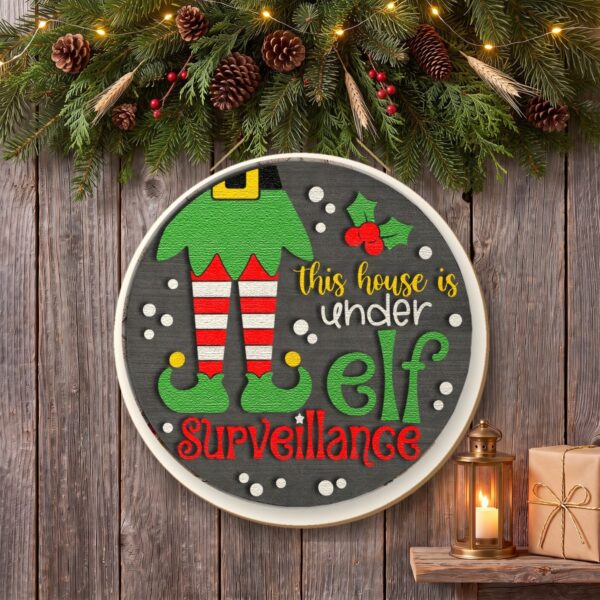 This House Is Under Elf Surveillance Sign on the wall This House Is Under Elf Surveillance Sign on the wall